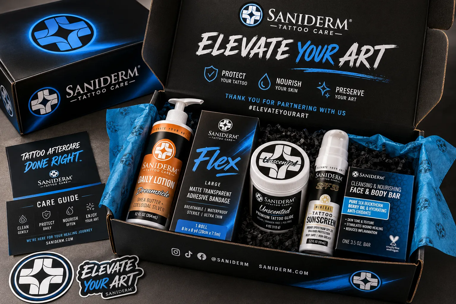 Saniderm creator welcome box with Flex bandage, daily lotion, tattoo glide, sunscreen, and face and body bar